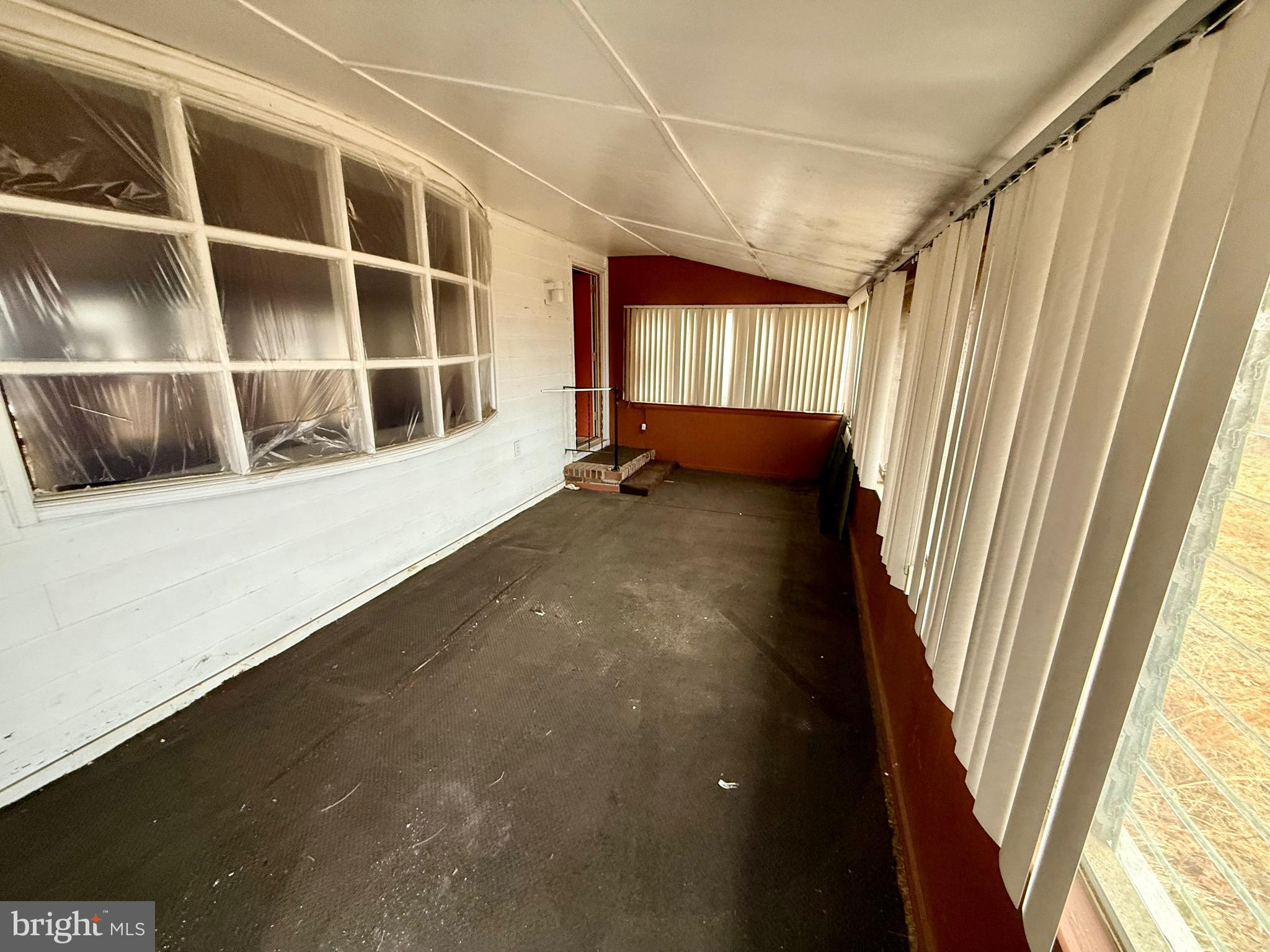 1053 Clayton Road Williamstown, NJ 08094 - Photo 5 of 24 a view of an empty room with a window