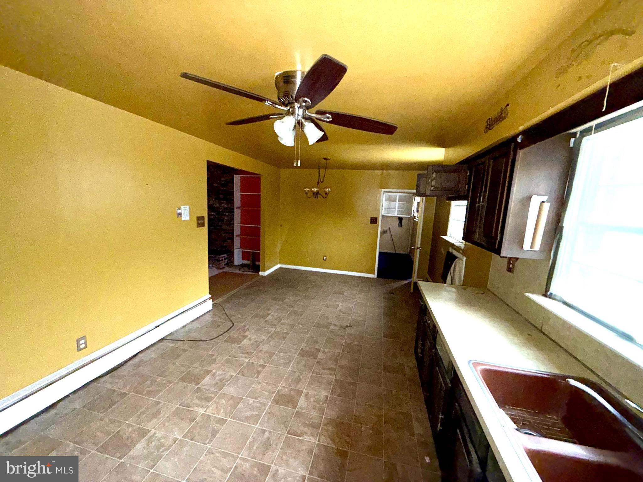 1053 Clayton Road Williamstown, NJ 08094 - Photo 6 of 24 a view of an empty room and fire place