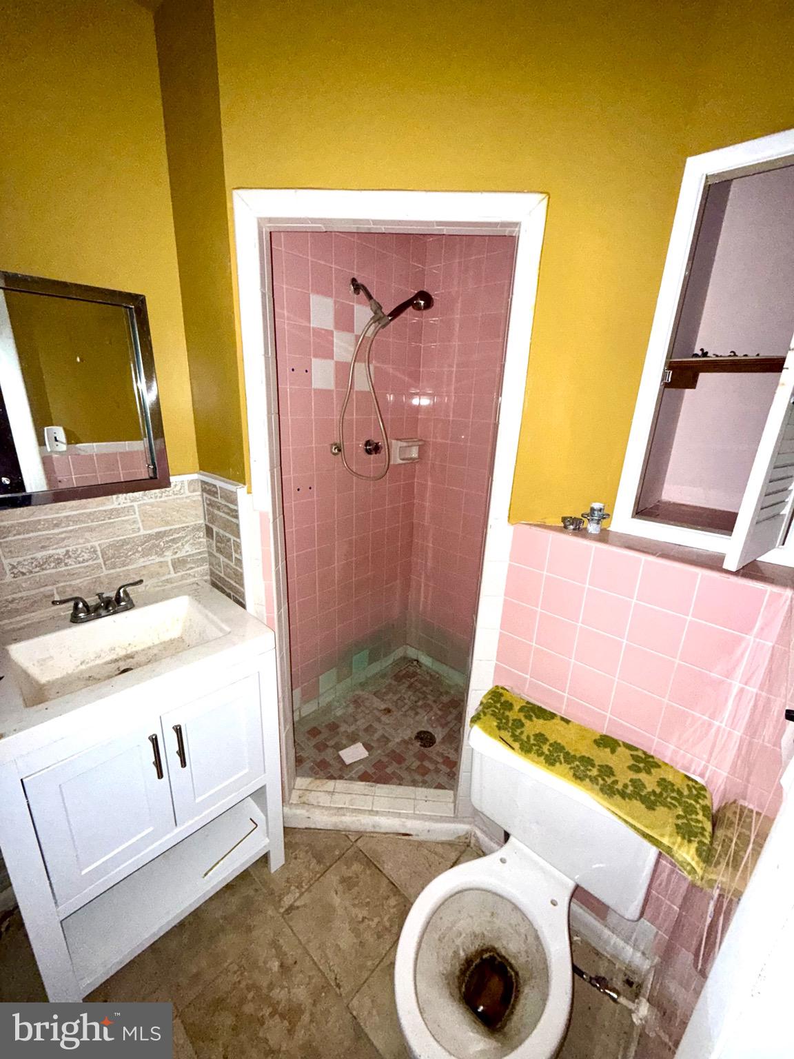 1053 Clayton Road Williamstown, NJ 08094 - Photo 10 of 24 a bathroom with a granite countertop sink and a mirror