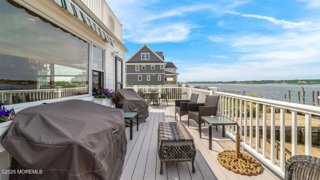 a view of balcony with furniture