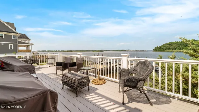 a view of a balcony with chairs
