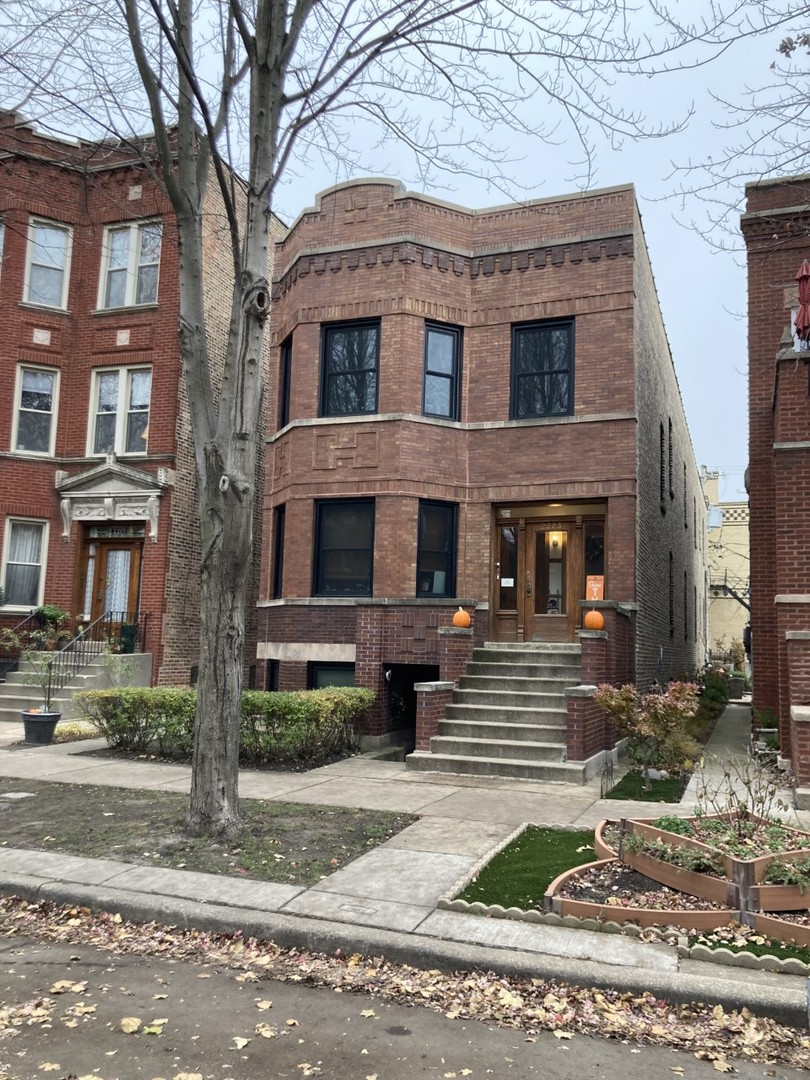 2223 West Iowa Street, Unit 2R Chicago, IL 60622 - Photo 1 of 20 a front view of a house