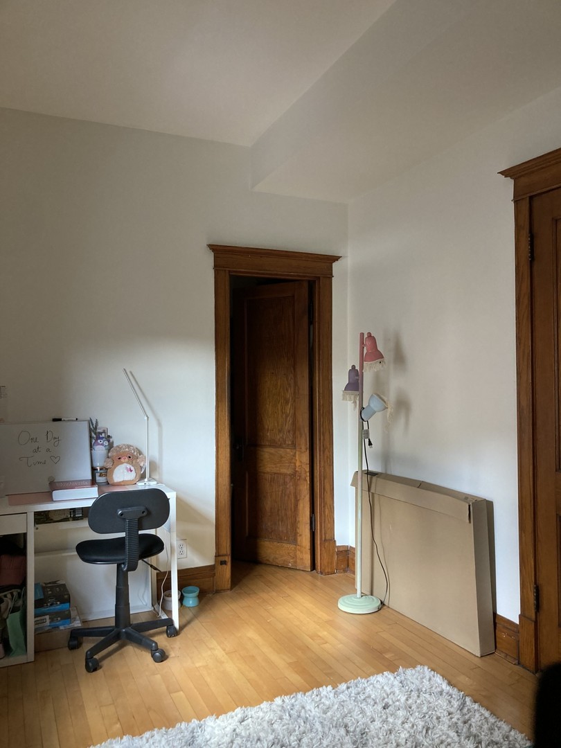 2223 West Iowa Street, Unit 2R Chicago, IL 60622 - Photo 14 of 20 a view of a workspace with furniture and closet