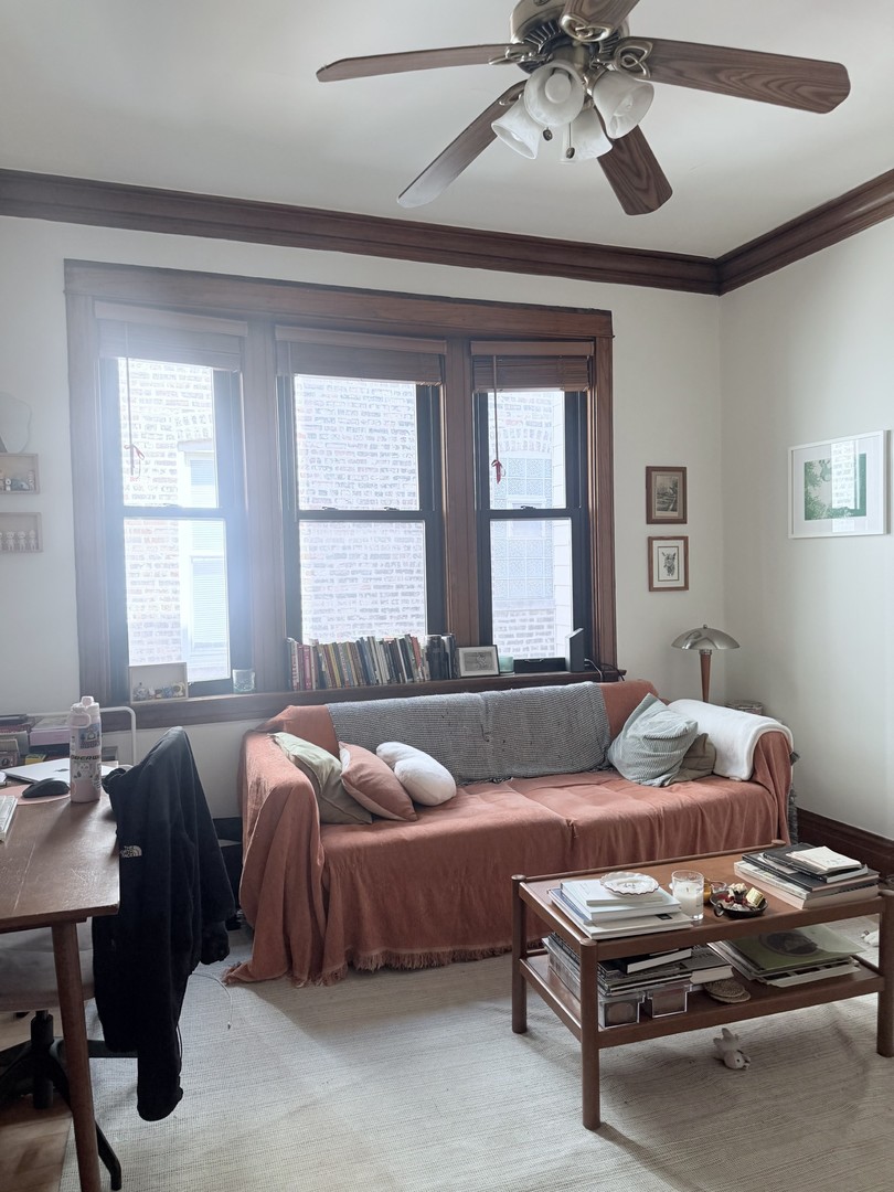 2223 West Iowa Street, Unit 2R Chicago, IL 60622 - Photo 4 of 20 a bedroom with furniture and windows