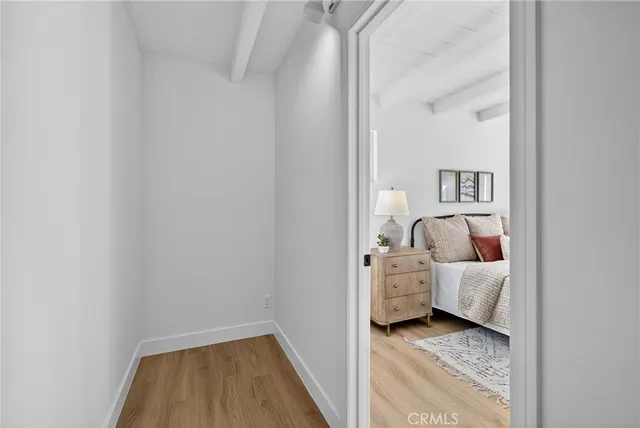 a view of utility room and bedroom