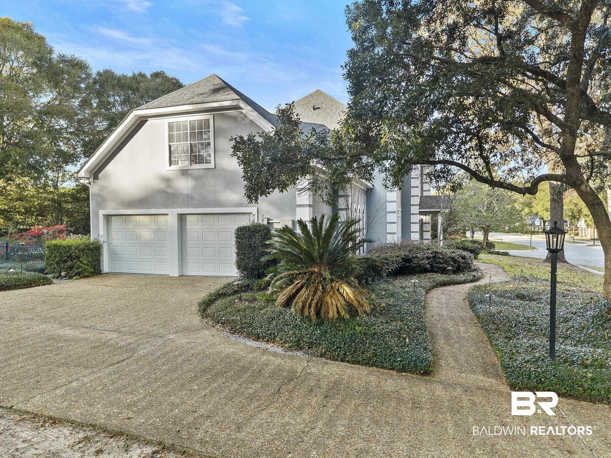 2100 Stonebrook Drive West Mobile, AL 36695 - Photo 55 of 60 View of front facade with a garage