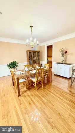 a living room with furniture a table and iron floor