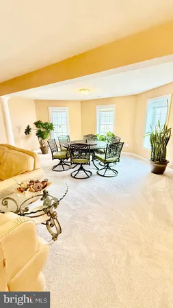 a view of a yard with patio
