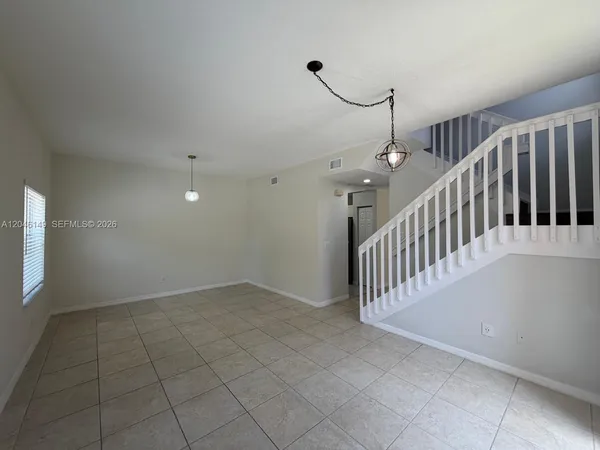 a view of a hallway with entryway