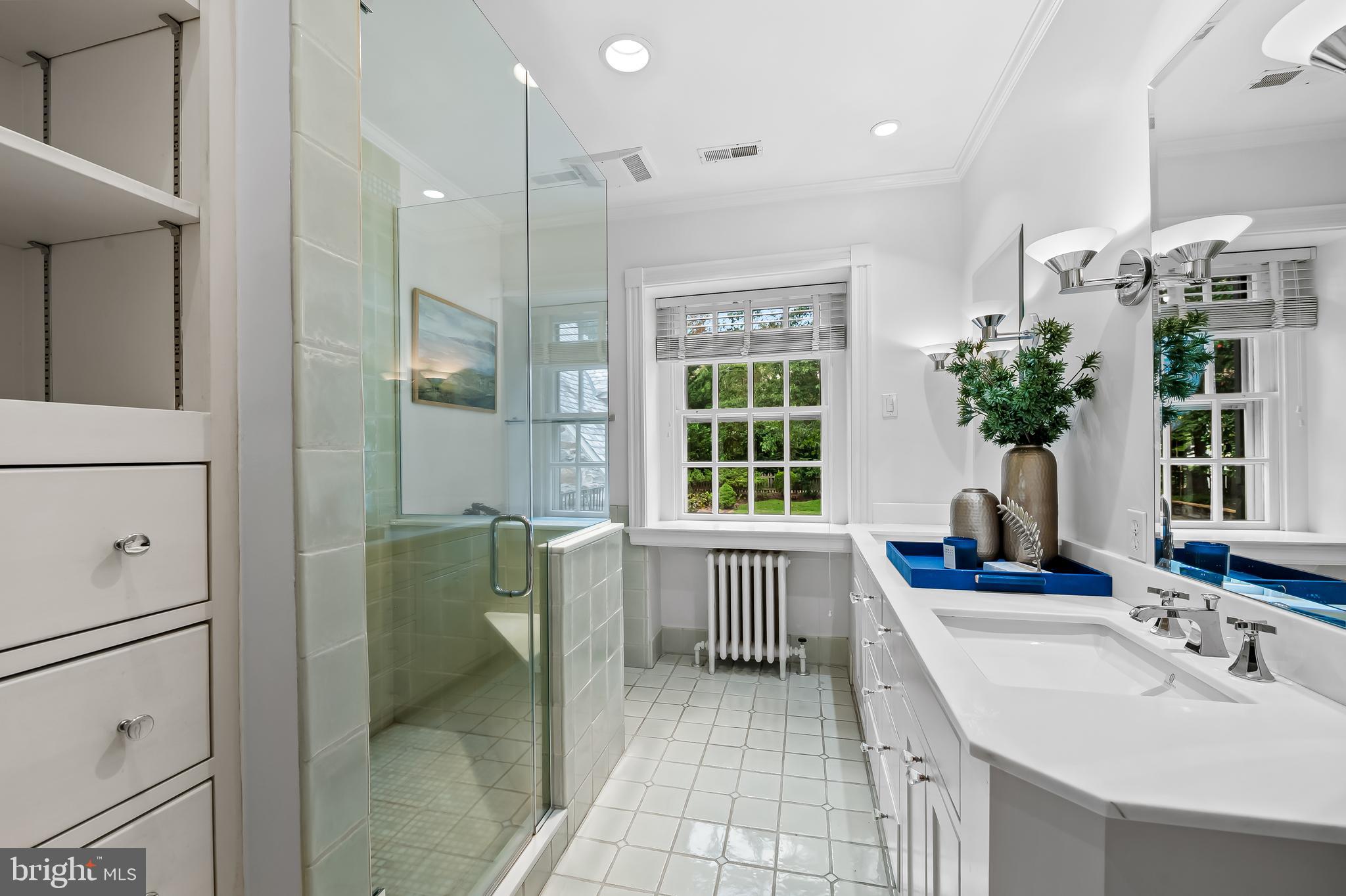 116 Enfield Road Baltimore, MD 21212 - Photo 36 of 71 a bathroom with a tub sink and glass door