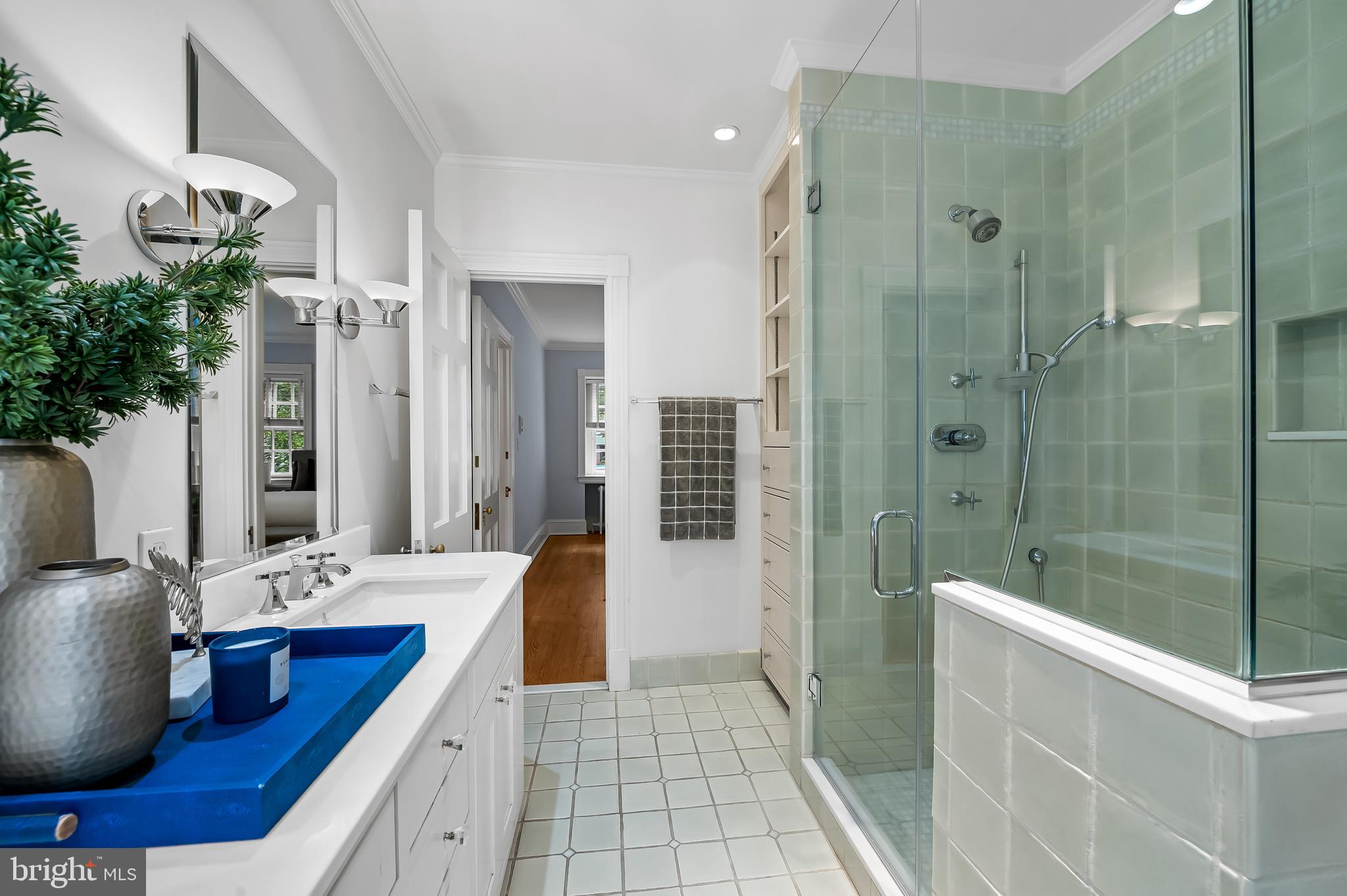 116 Enfield Road Baltimore, MD 21212 - Photo 37 of 71 a bathroom with a double vanity sink and mirror