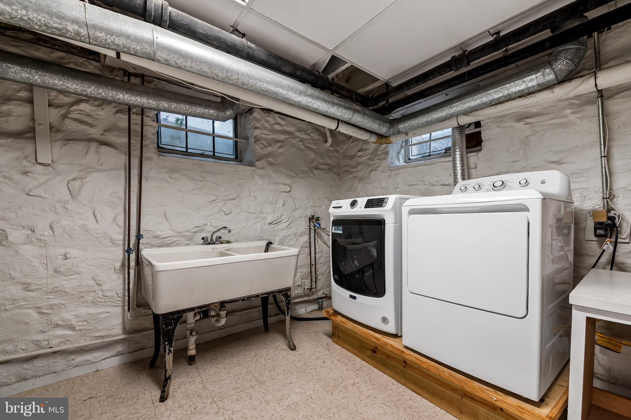 116 Enfield Road Baltimore, MD 21212 - Photo 54 of 71 a utility room with dryer and washer