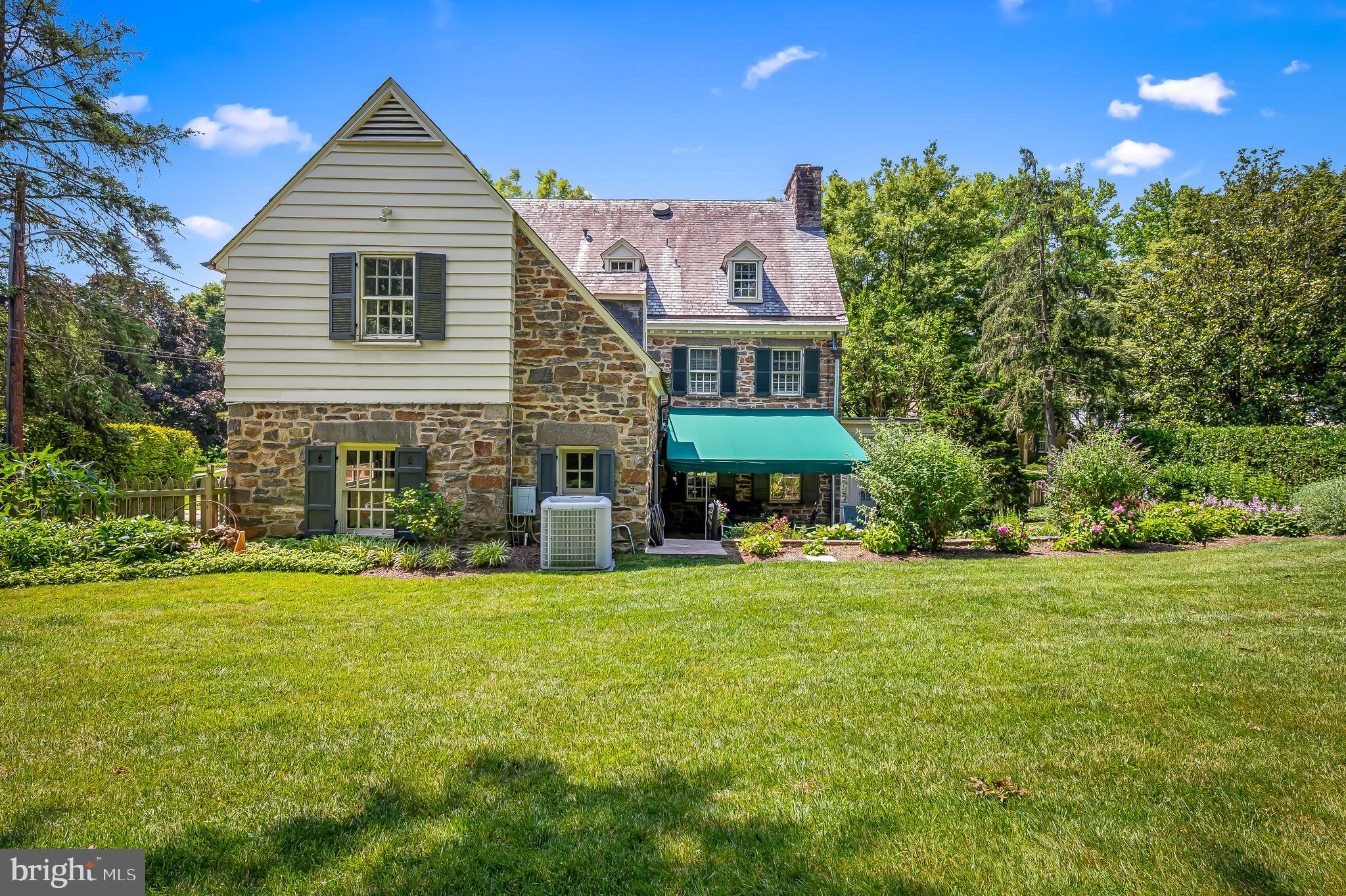 116 Enfield Road Baltimore, MD 21212 - Photo 65 of 71 a front view of a house with a garden