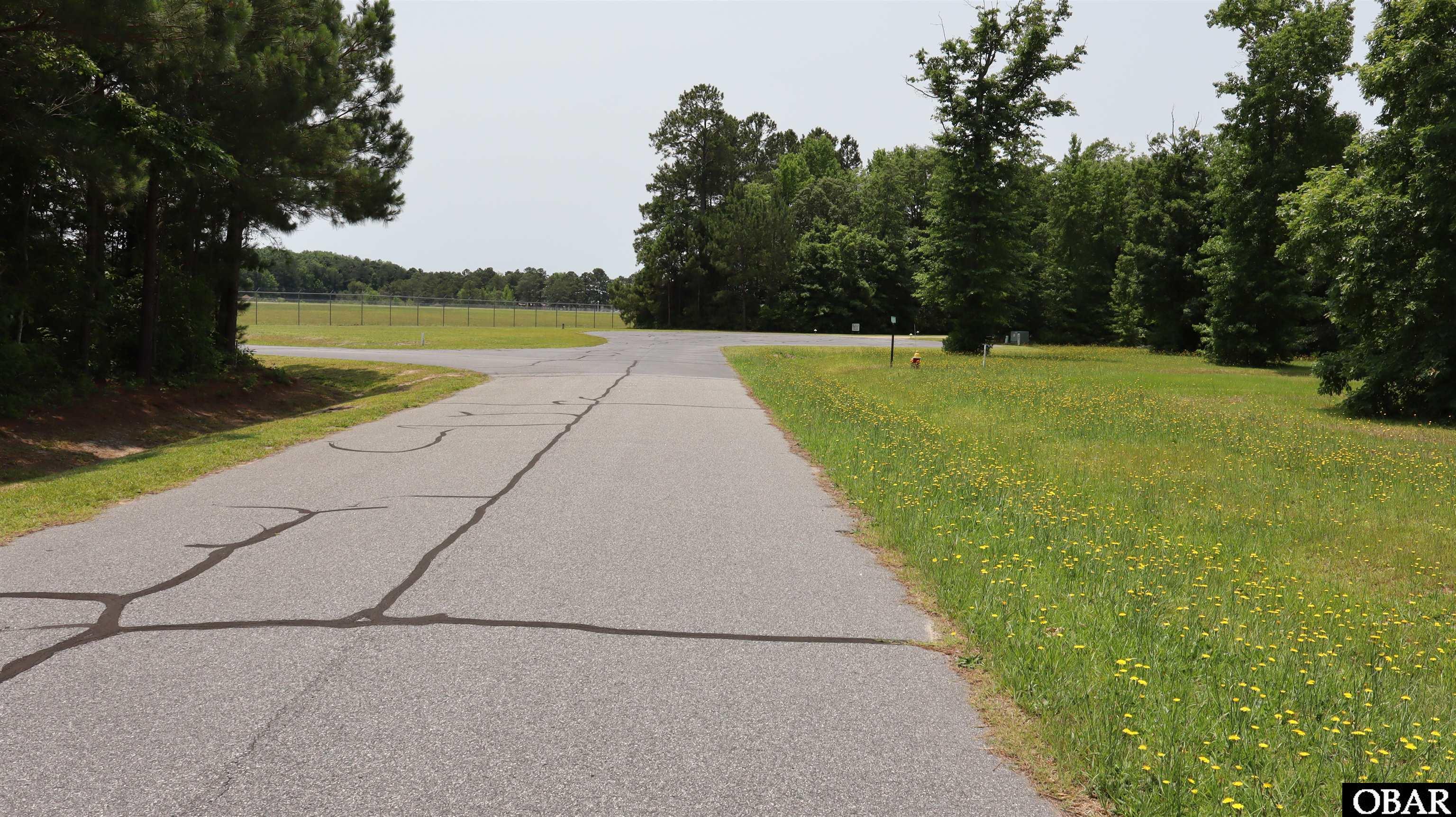112 Aviator Drive Maple, NC 27956 - Photo 32 of 33 Very Short Taxi Turn Left to Gate