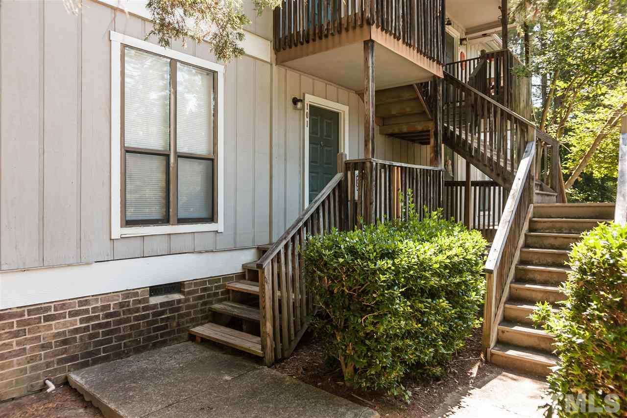 5808 Pointer Drive Raleigh, NC 27609 - Photo 1 of 19 a front view of a house with a yard