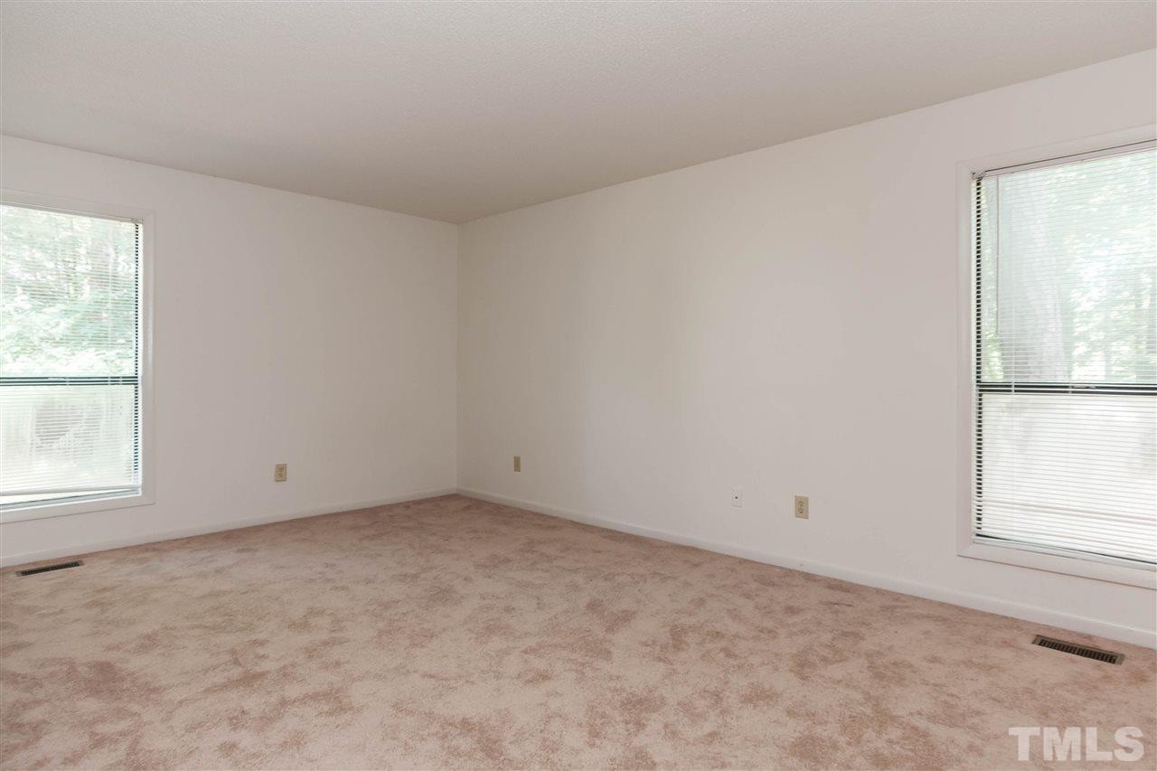 5808 Pointer Drive Raleigh, NC 27609 - Photo 13 of 19 an empty room with a window