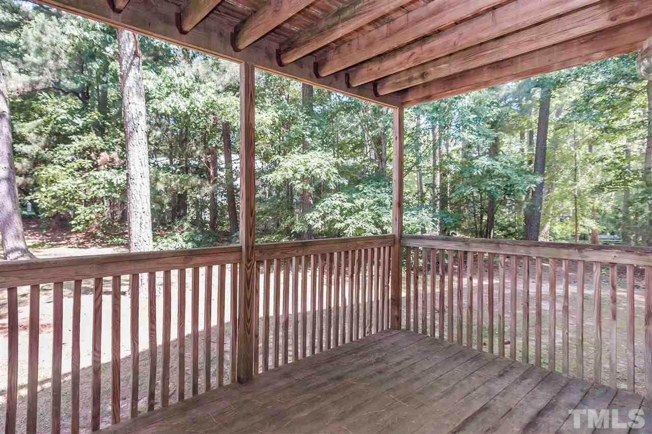 5808 Pointer Drive Raleigh, NC 27609 - Photo 18 of 19 a view of a porch with wooden floor