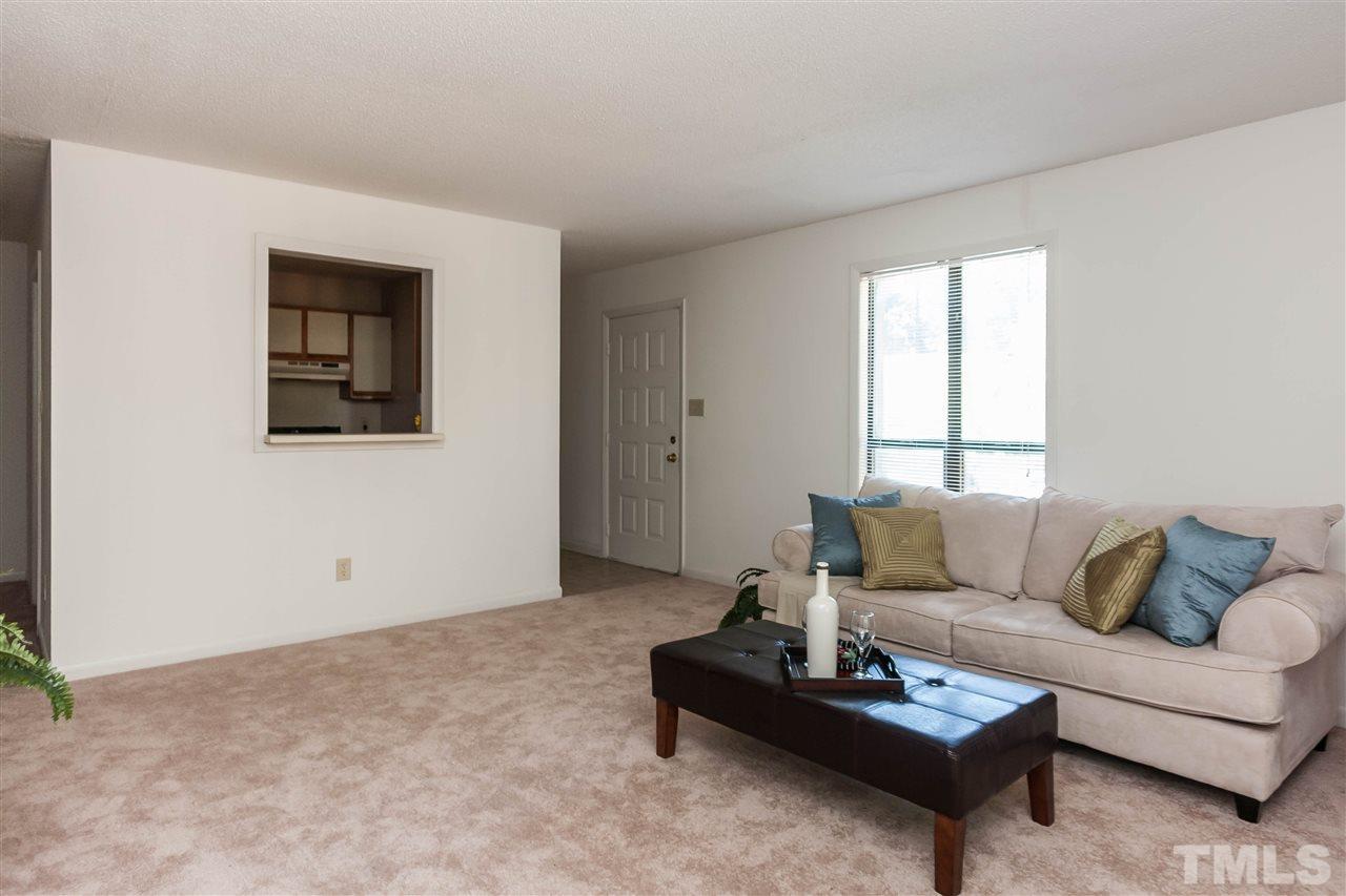 5808 Pointer Drive Raleigh, NC 27609 - Photo 6 of 19 a living room with furniture and a window