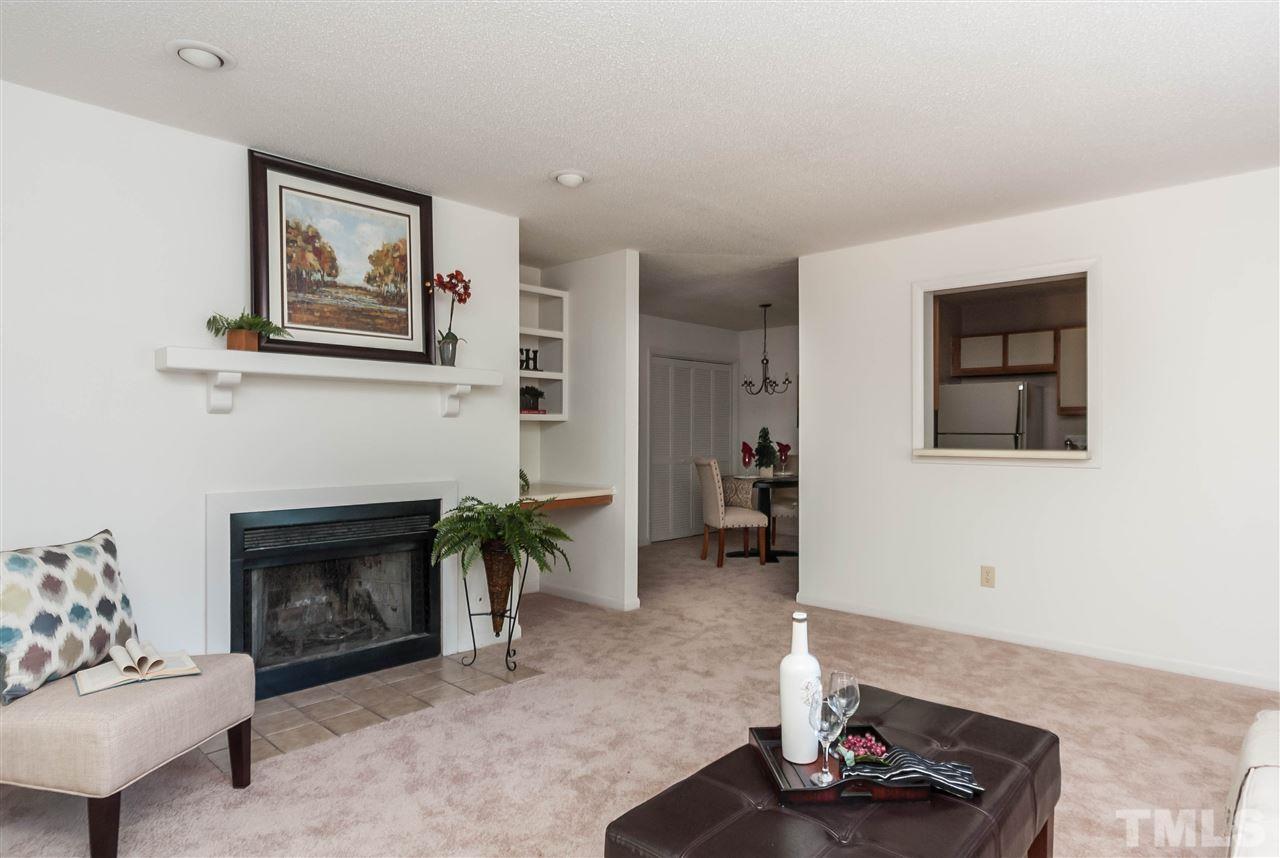 5808 Pointer Drive Raleigh, NC 27609 - Photo 7 of 19 a living room with furniture and a fireplace