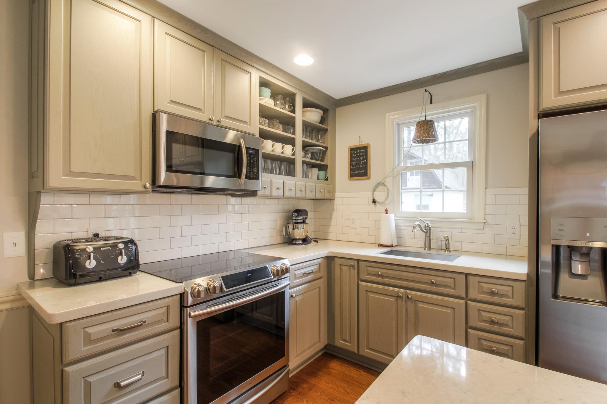 3637 North Chapel Road Franklin, TN 37067 - Photo 11 of 30 a kitchen with a sink stove and microwave