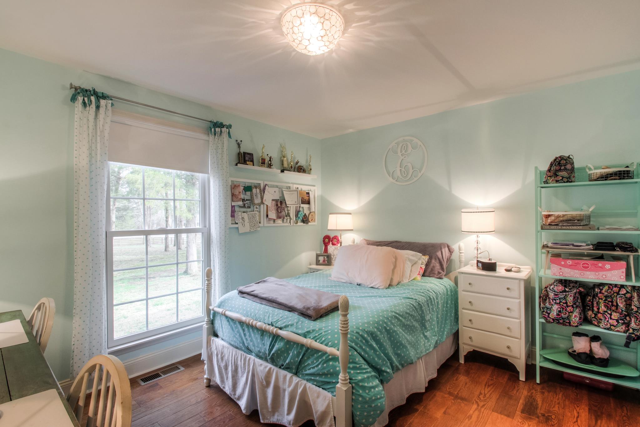 3637 North Chapel Road Franklin, TN 37067 - Photo 15 of 30 a bedroom with a bed and a window