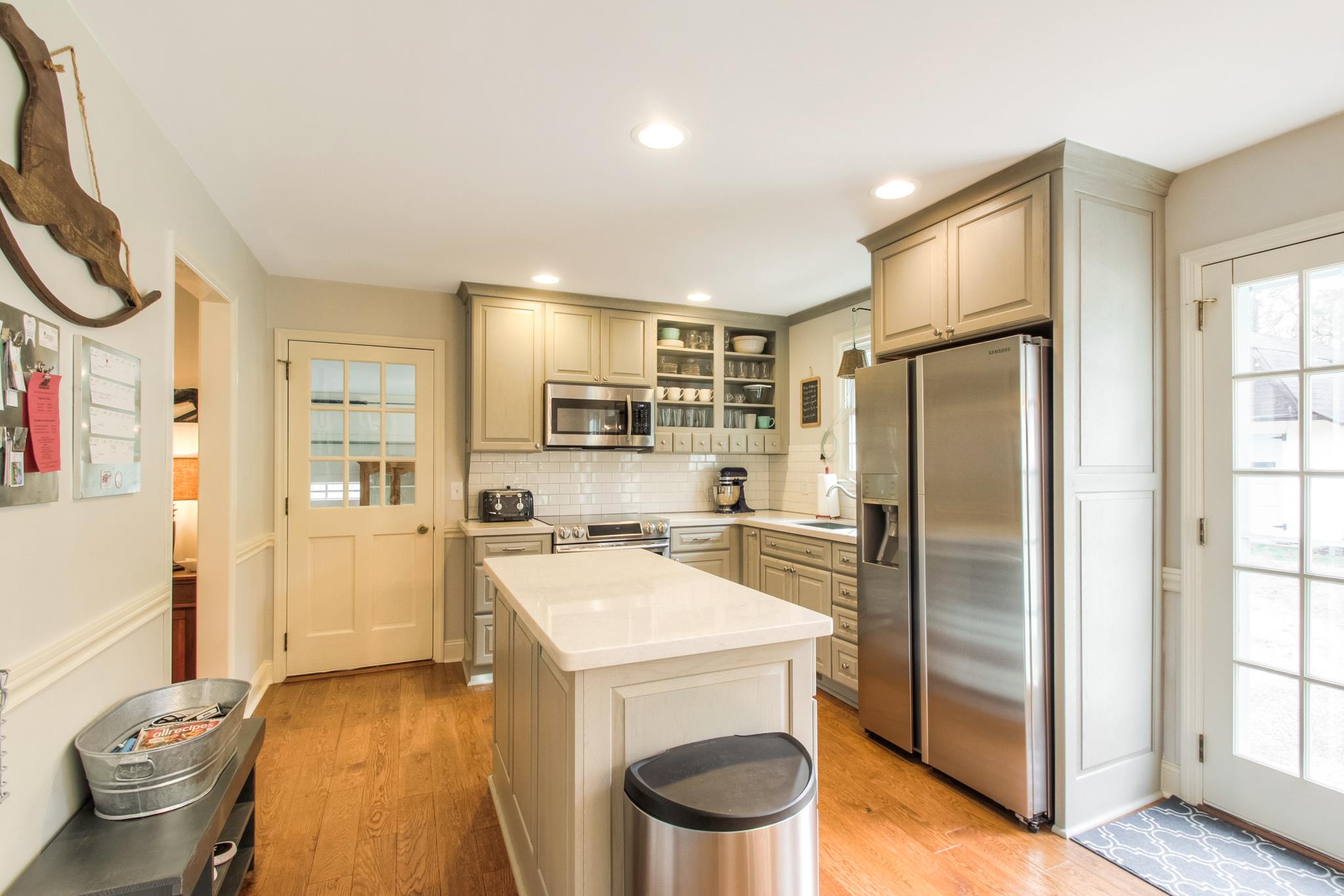 3637 North Chapel Road Franklin, TN 37067 - Photo 8 of 30 a kitchen with a refrigerator a sink and cabinets