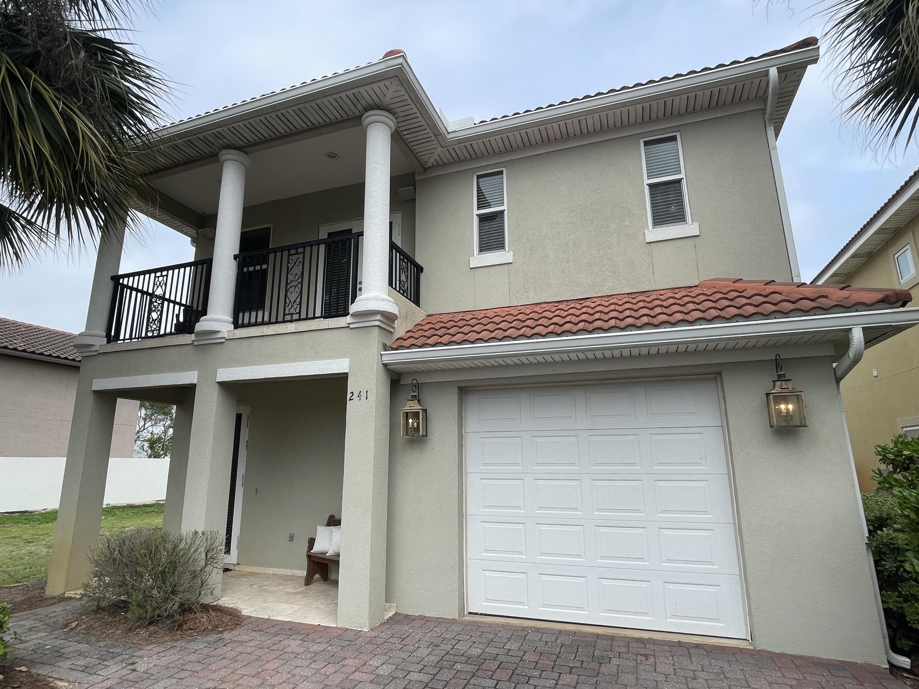 241 Inverrary Drive Destin, FL 32541 - Photo 24 of 24 a front view of a house