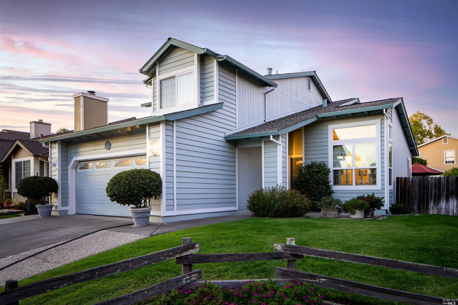 2407 Button Court Santa Rosa, CA 95403 - Photo 1 of 1 a front view of a house with garden