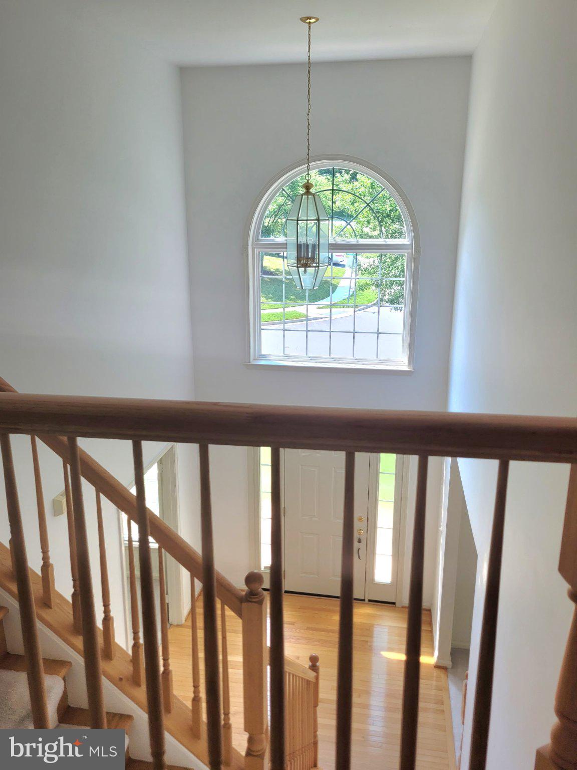 1202 Strausberg Street Accokeek, MD 20607 - Photo 27 of 43 Bright entryway with elegant staircase.