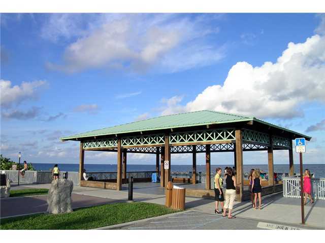 169 Southeast Wavecrest Way Boca Raton, FL 33432 - Photo 18 of 25 an outdoor view of a building