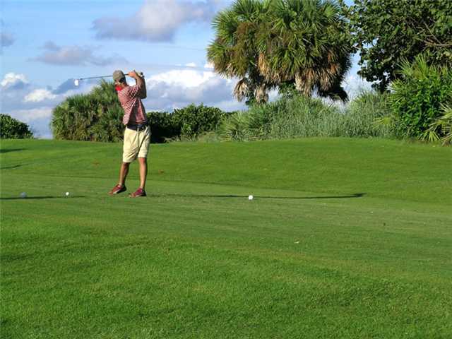 169 Southeast Wavecrest Way Boca Raton, FL 33432 - Photo 22 of 25 a view of a golf course with a play ground