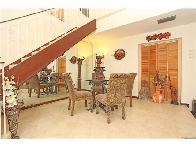 169 Southeast Wavecrest Way Boca Raton, FL 33432 - Photo 6 of 25 a view of a chairs and table in the patio