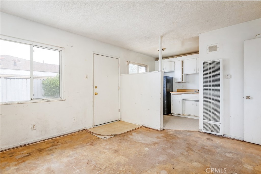 321 North K Street Lompoc, CA 93436 - Photo 13 of 32 a view of a kitchen with a sink and refrigerator