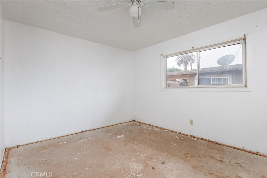 321 North K Street Lompoc, CA 93436 - Photo 20 of 32 an empty room with a window