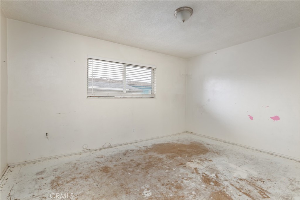 321 North K Street Lompoc, CA 93436 - Photo 25 of 32 an empty room with a window