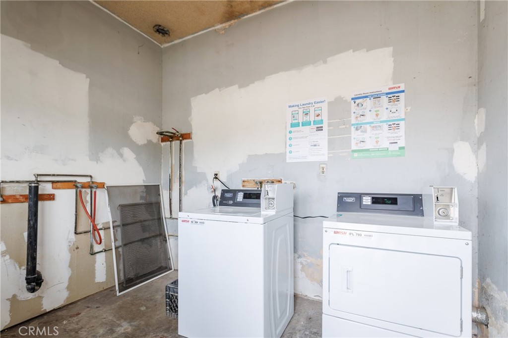 321 North K Street Lompoc, CA 93436 - Photo 29 of 32 a view of kitchen and washer and dryer