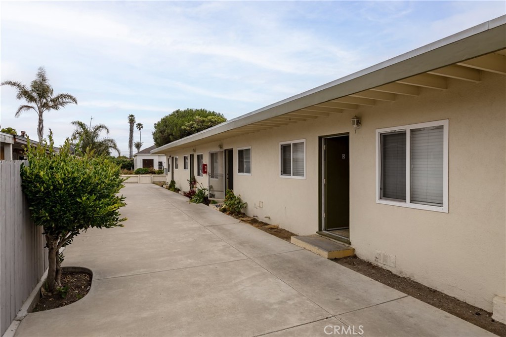 321 North K Street Lompoc, CA 93436 - Photo 4 of 32 a house view with a garden space