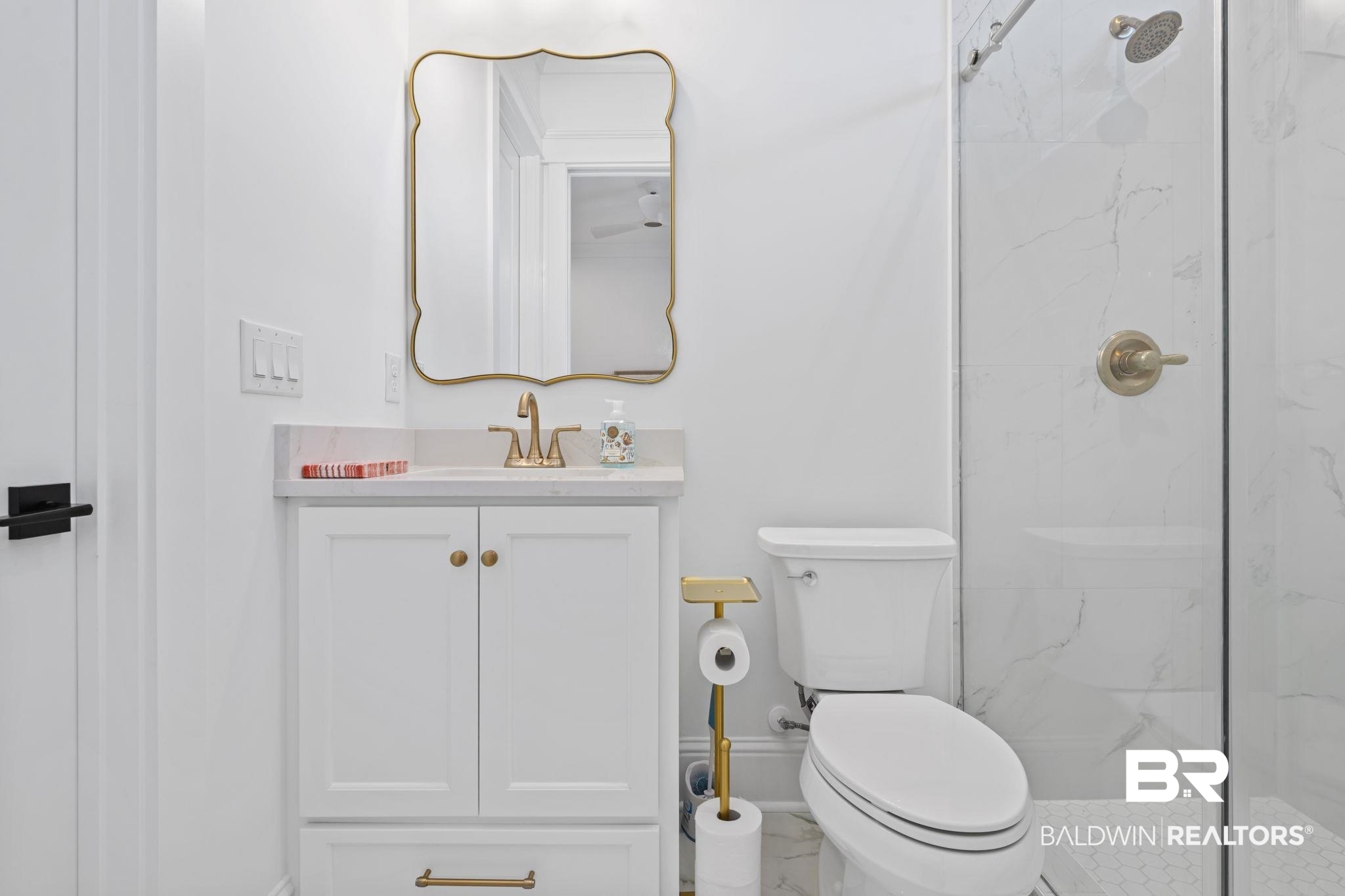 30313 River Road Orange Beach, AL 36561 - Photo 32 of 50 Full bathroom featuring a marble finish shower, vanity, and marble finish flooring