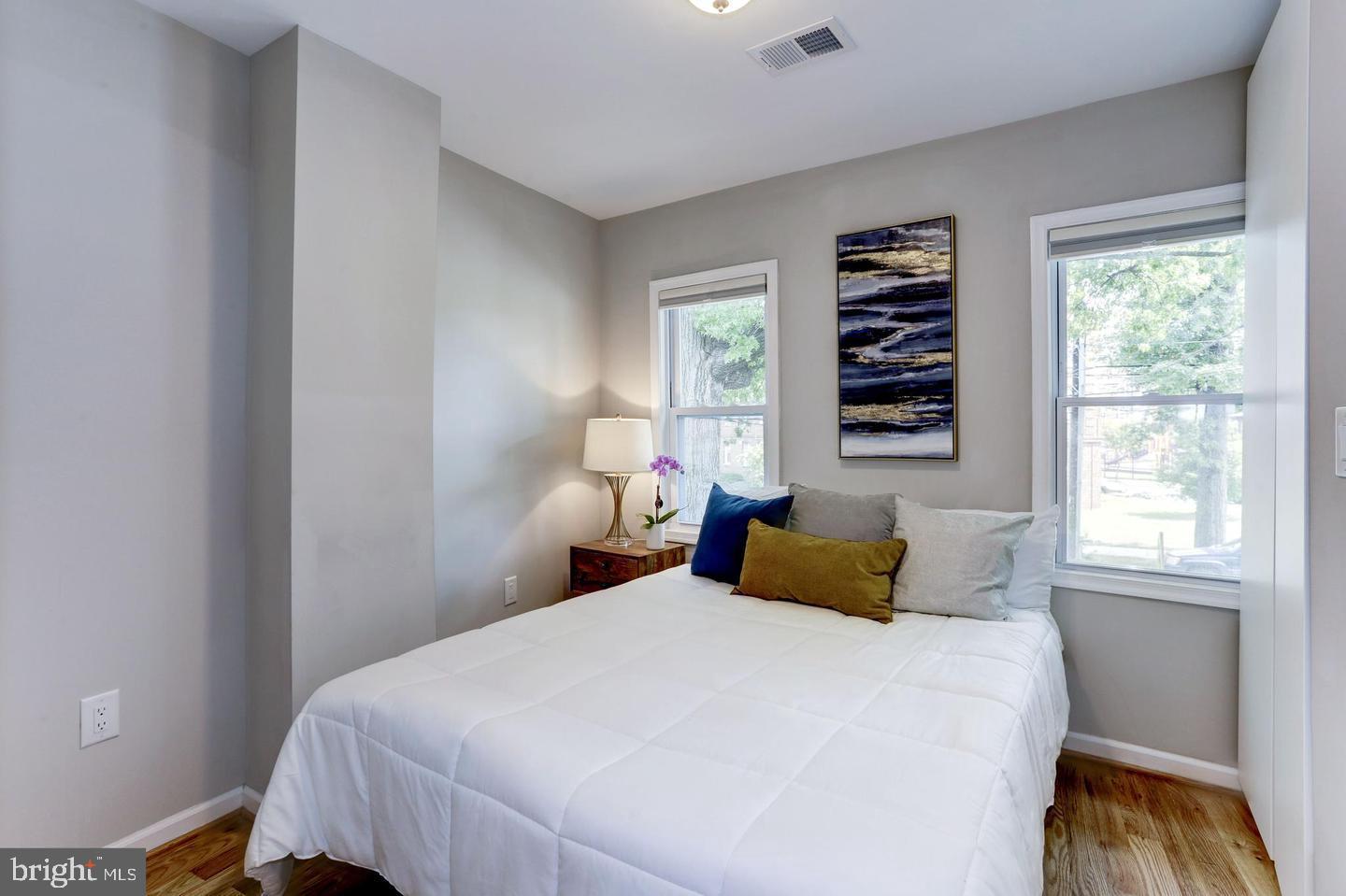 1816 Minnesota Avenue Southeast Washington, DC 20020 - Photo 11 of 13 a bedroom with a bed and a window