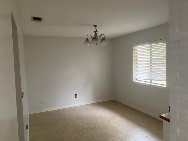 a view of a livingroom with a window