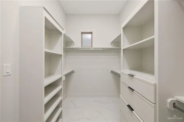 a view of an empty walk in closet