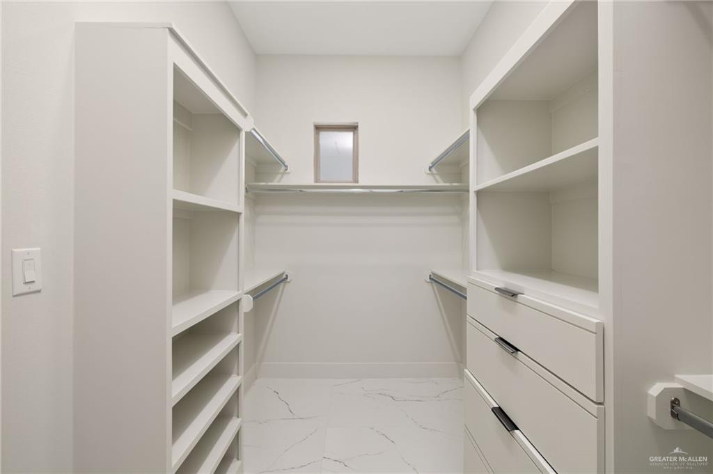 2610 East Julian Road Harlingen, TX 78552 - Photo 9 of 21 a view of an empty walk in closet