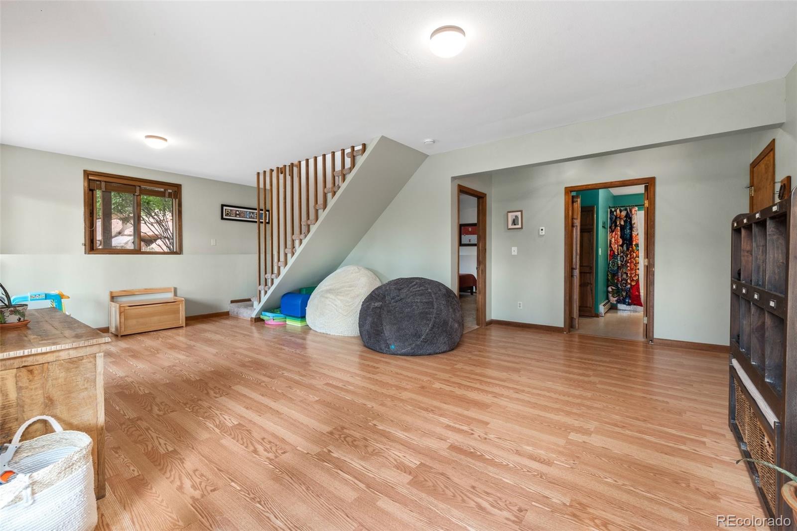 30540 Rand Road Conifer, CO 80433 - Photo 19 of 37 a view of a livingroom with furniture and staircase
