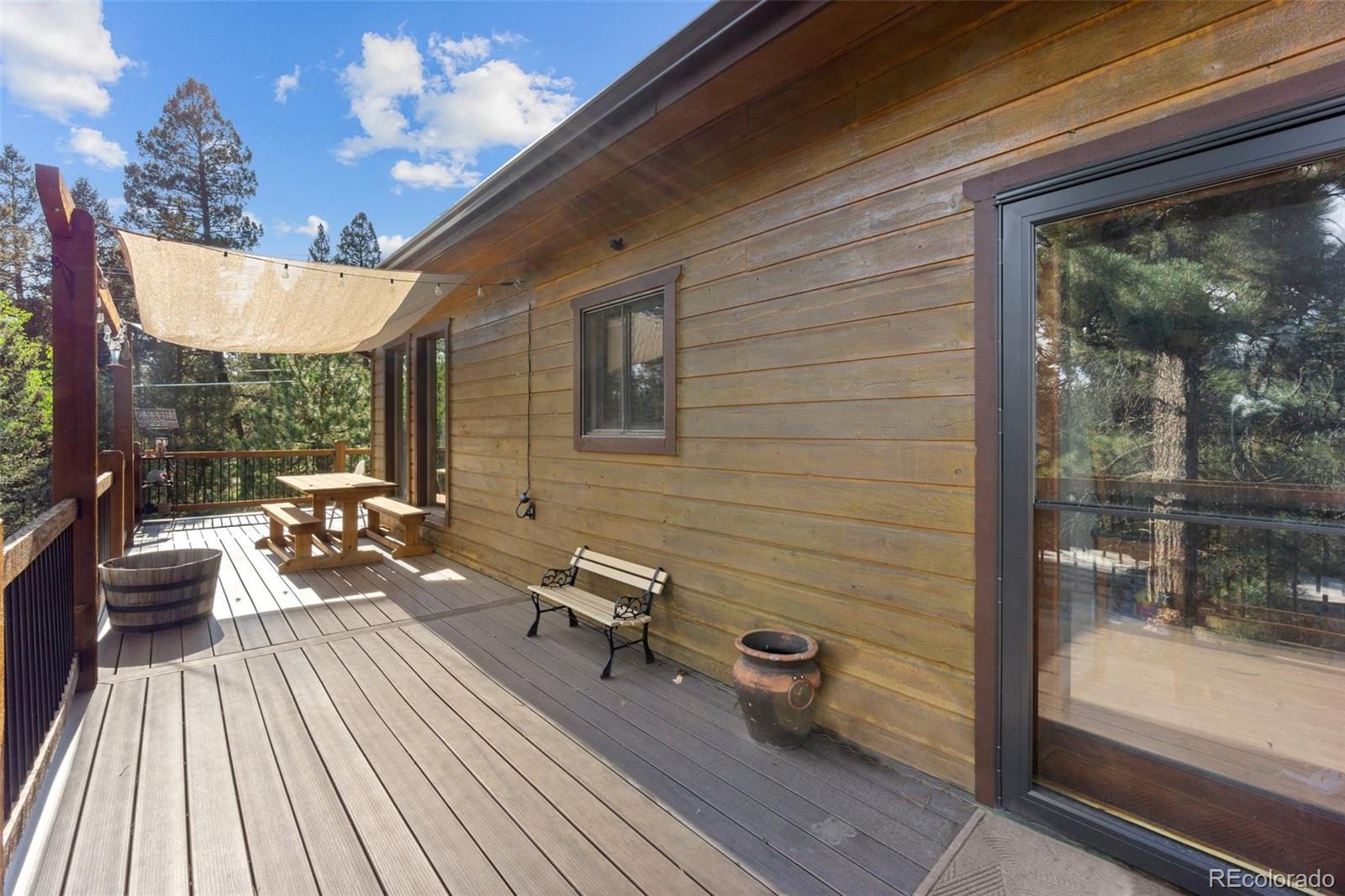 30540 Rand Road Conifer, CO 80433 - Photo 27 of 37 a outdoor space with furniture