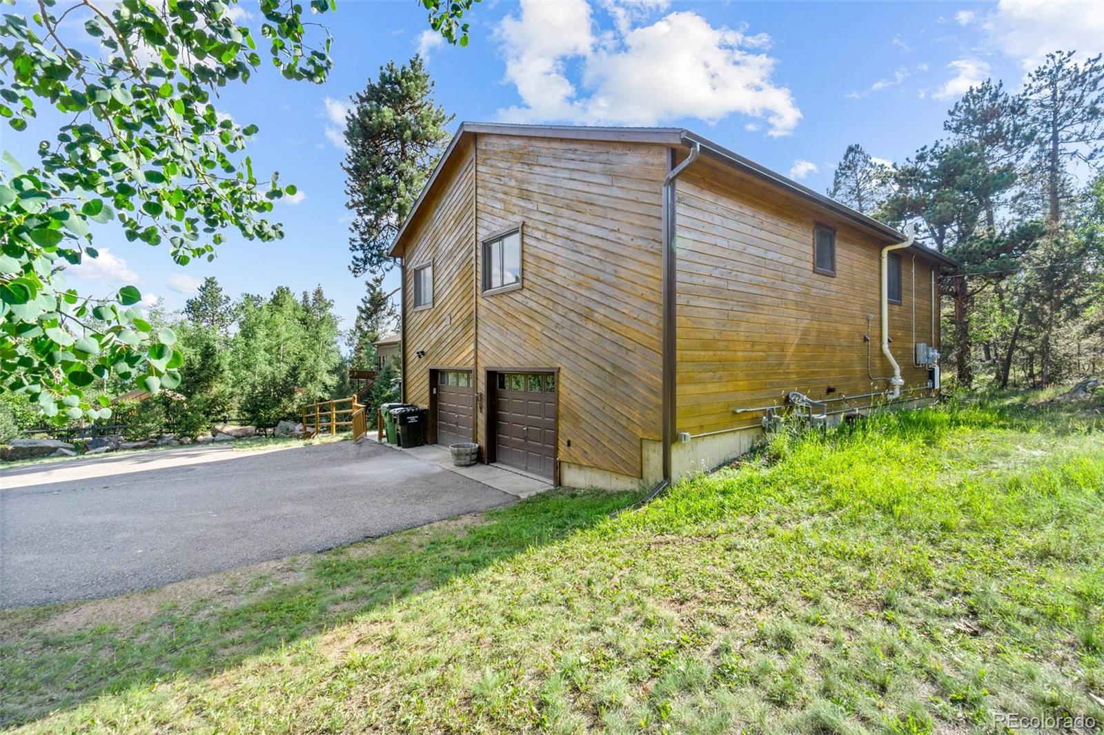 30540 Rand Road Conifer, CO 80433 - Photo 29 of 37 a view of a back yard of the house