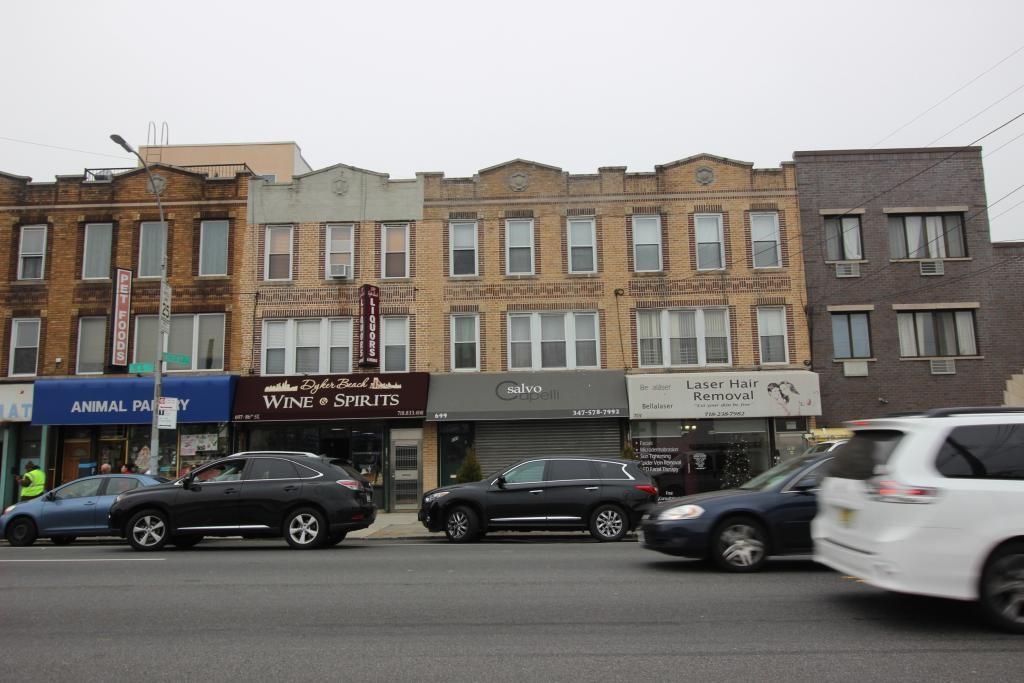 a car parked in front of a houses
