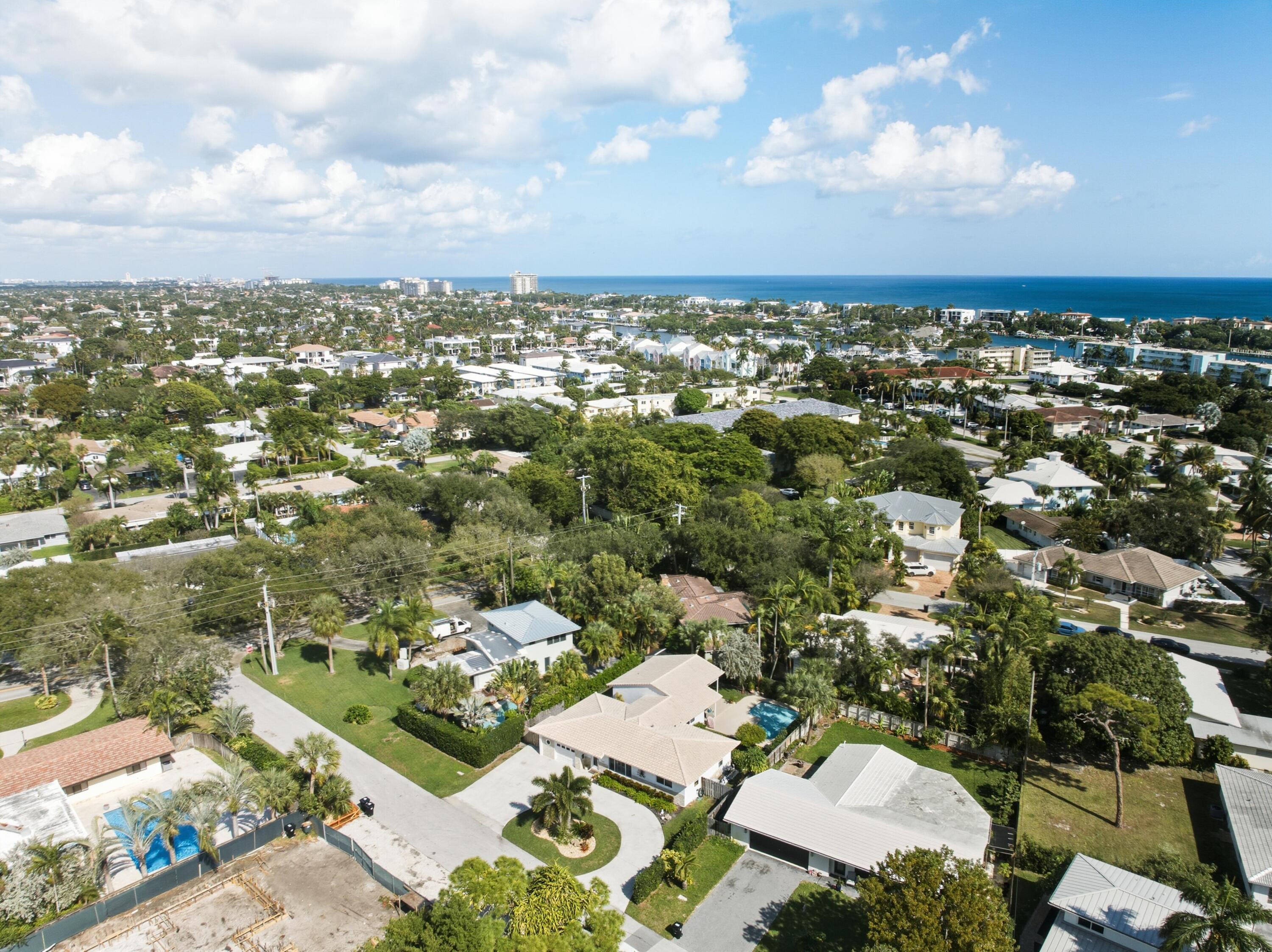 2642 Northeast 26th Terrace Lighthouse Point, FL 33064 - Photo 47 of 53 an aerial view of a city with lots of residential buildings