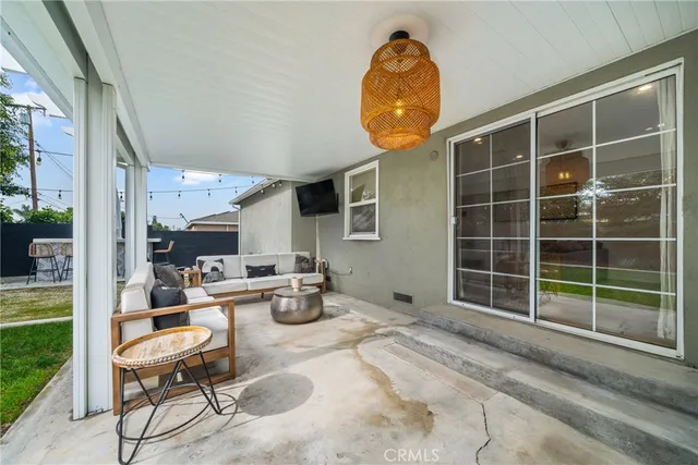 a view of a living room and a front door