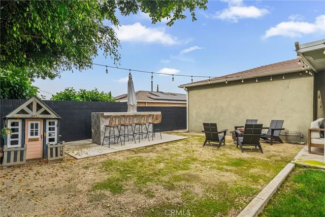a front view of a house with swimming pool