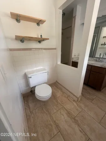 a bathroom with a toilet